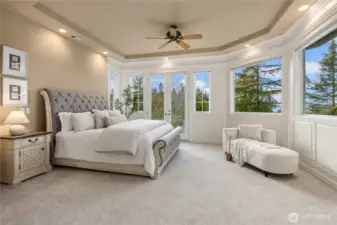 Ahhh, the natural beauty of the private lot is a perfect backdrop for the sumptuous Primary Suite. All the gorgeous wood trim detail, and a view of DT Seattle off the juliet balcony.