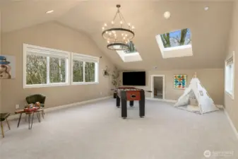 Upper floor Playroom/Family room is ready for your needs, wants and imagination. The little door is great storage or a child's 'hideaway'.