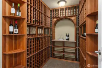This is the stunning 600+ bottle wine room, with space for sitting and tasting if desired.
