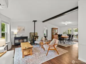 Living room & dining room with vaulted ceilings.