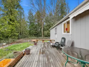 Back deck length of the home.