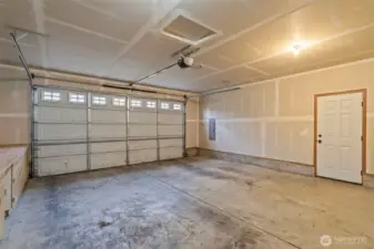 Two car garage with built in shelving