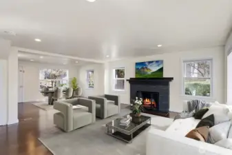 The heart of the home is an expansive, open-concept living and dining sanctuary, seamlessly unified by a Dover White color drench.