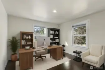 Ideally positioned adjacent to a three-quarter bath, this main-floor bedroom serves as a secluded guest retreat or a sophisticated home office.