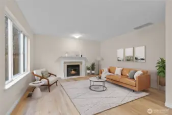 Family room has warm gas fireplace