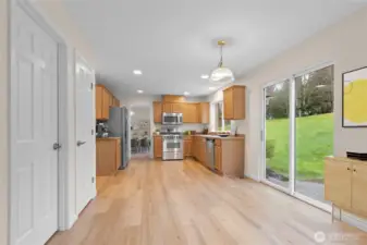 Kitchen features pantry, casual dining and slider to the back yard