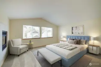 Large primary suite with gas fireplace (virtually staged)