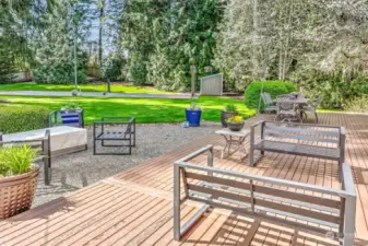 Entertain on the large deck and patio area which has natural gas access and electric awning.