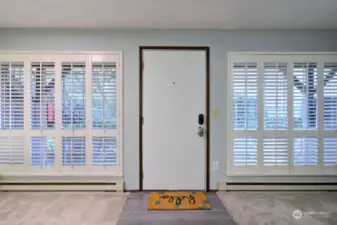 Custom plantation shutters provide both privacy & natural light.