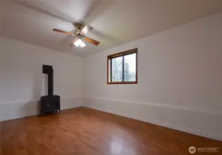 Lower Level living room with propane stove to keep you cozy!