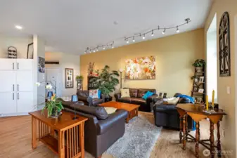 A view of the conversation area, this with the dining area, fireplace area and cooking bar - multiple conversation areas for time with your friends.