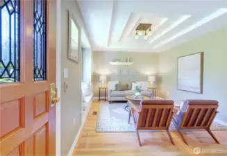 Living Room off the entry is away from the communal spaces for private conversations and solace.