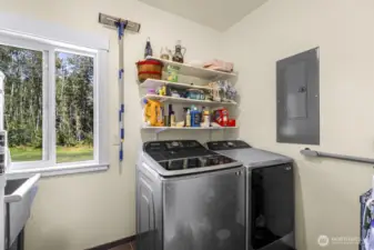 The utility room is adjacent to the garage