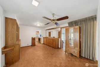 Dining area with built-ins and door to bonus/rec area