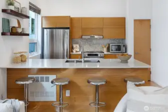 A large eat-in Kitchen with ample cabinetry and storage.