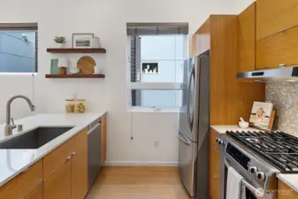 Ample cabinetry, as well as a nice pantry area to the right!