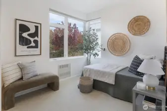 Spacious guest bedroom on the same level as the primary suite!