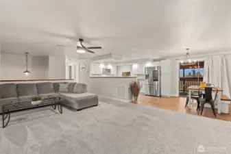 Living, dining, kitchen. Access to backyard -- deck