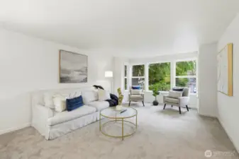 Formal living room just off the foyer is far enough away from the great room to invite private conversation even when the big game is on in the great room!