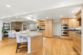 Peninsula seating keeps guests nearby during meal prep.