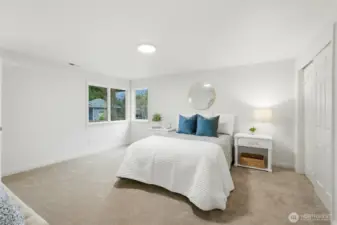 Primary suite offers luxurious space for everything you desire.