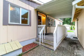 This is the backside of the front porch. Fully covered from double car garage to keep you dry on those rainy days.