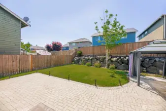 Backyard with landscape lighting and gazebo. Pre-wired for hot tub.