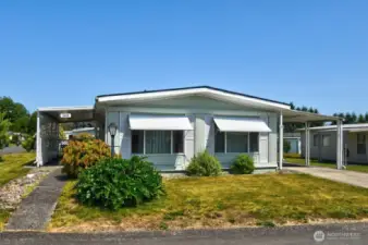 Home features newer windows and heat pump for year-round comfort.