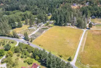Property is across the street from the historic Inn at Ship Bay and adjacent The Little Farm on Olga Road.