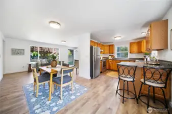 Upon entering you will enjoy this kitchen with all stainless aplliances and vinyl plank flooring along with granite counter tops and plentiful cabinetry.