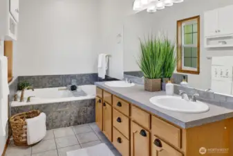 A close up view of primary bathroom with jetted tub and even has Hot Water on demand pump that was added in 2021.
