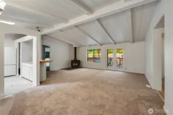 Enter to find vaulted ceilings and an open floorplan.