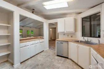 The large kitchen also has a pantry area.
