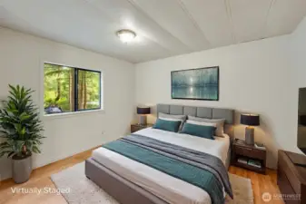 This extra finished room contains the second bathroom but does not have a closet. (shown virtually staged)