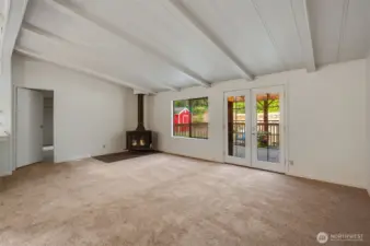 The living room has french doors that open out to this fantastic covered patio!