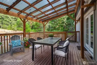 Patio space shown here virtually staged.