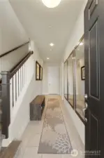 Big entry leading to lower level bedroom & bath suite.