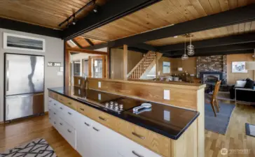 Open kitchen area, keeps the chef in the home space to cook and still be part of all social gatherings.