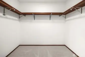 A generous walk-in closet can accommodate all of your favorite things.