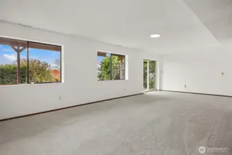 Downstairs, this huge bonus room offers so many possibilities.