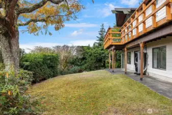 A lower patio and lawn are perfect for play.