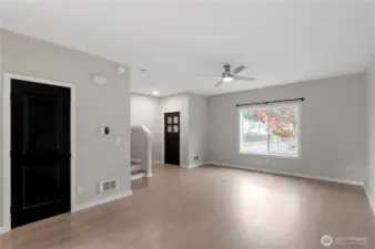 Living room with powder room access