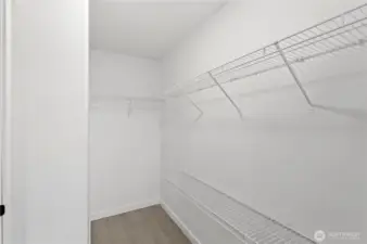 Primary bedroom large walk in closet