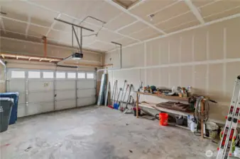 Spacious 2 car garage features expanded ceiling height for extra storage