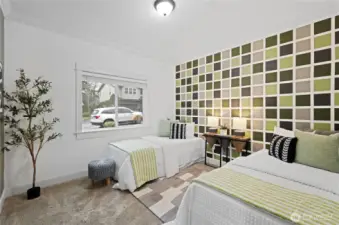 One of two additional bedrooms on the main floor with views to the front of the house.