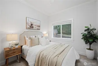 This third bedroom on the main floor with views to the back yard.