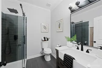 Fully remodeled 3/4 bath on the main floor with motion sensor light.