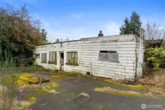 The old gas station building still remains.