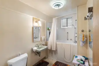 ADU full bath offers a walk in tub