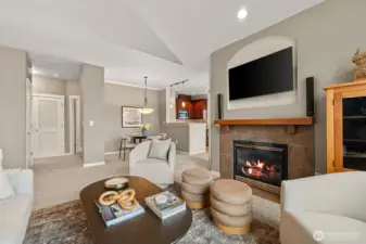 Living room offers gas fireplace and easy flow into the great room